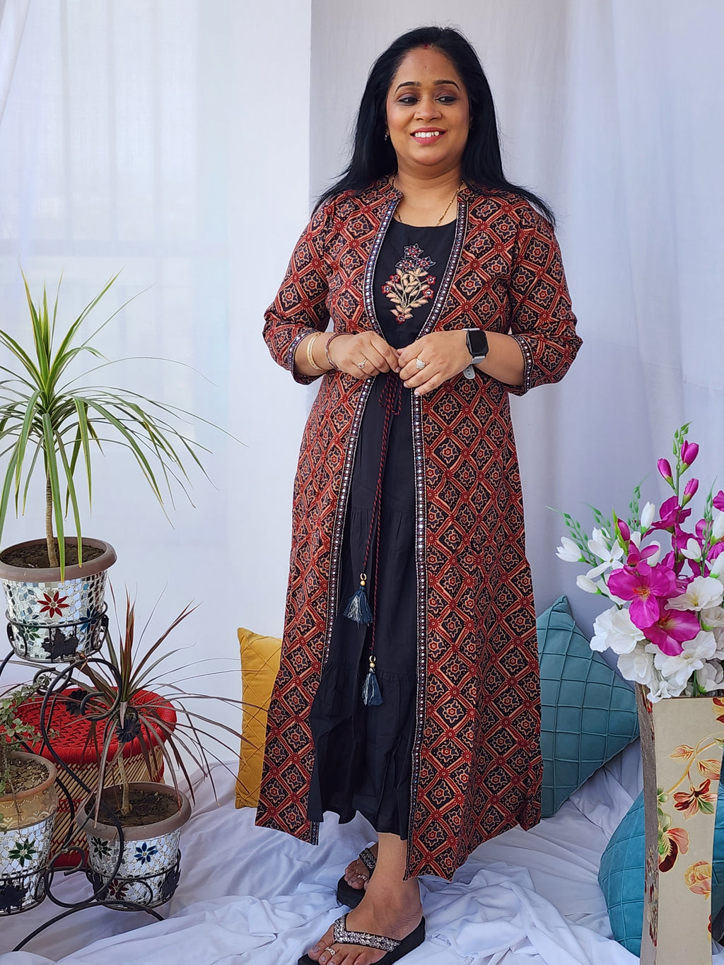 Ajrakh Gown with jacket and Embeliished Yoke.